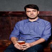 Ron Livingston consuming alcohol